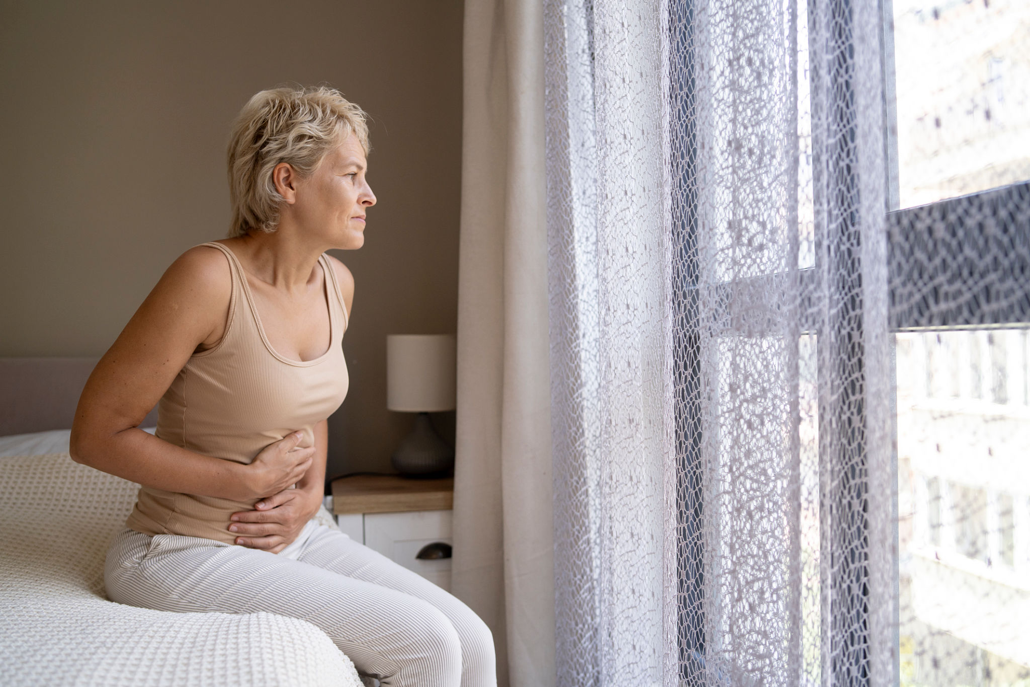 pancia gonfia in menopausa con ritenzione idrica e senso di pesantezza addominale